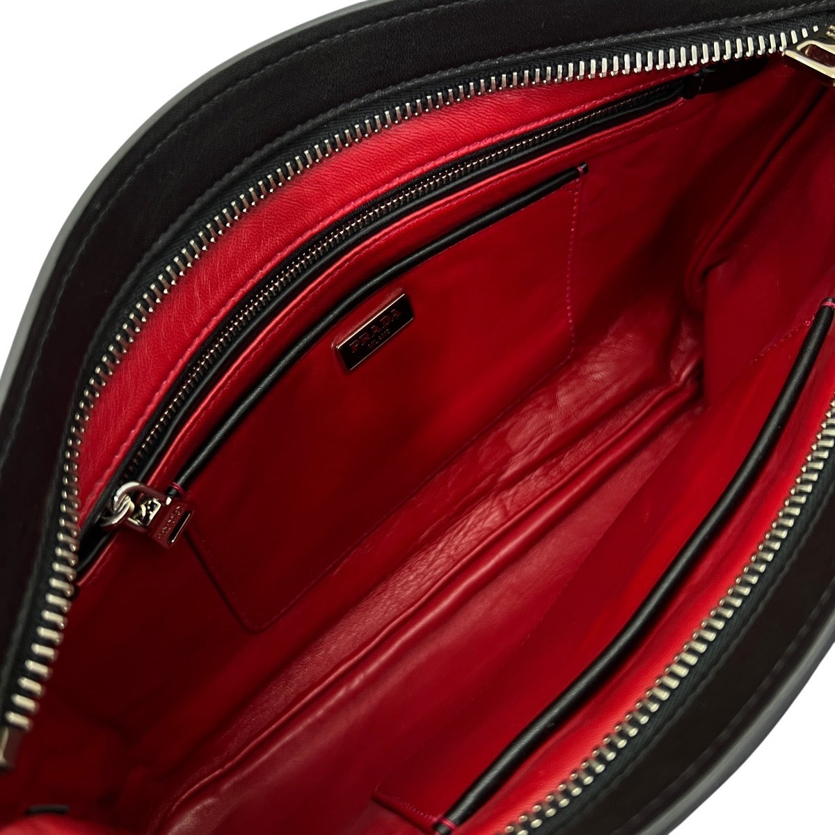 PRADA POCHETTE MEDIA IN PELLE