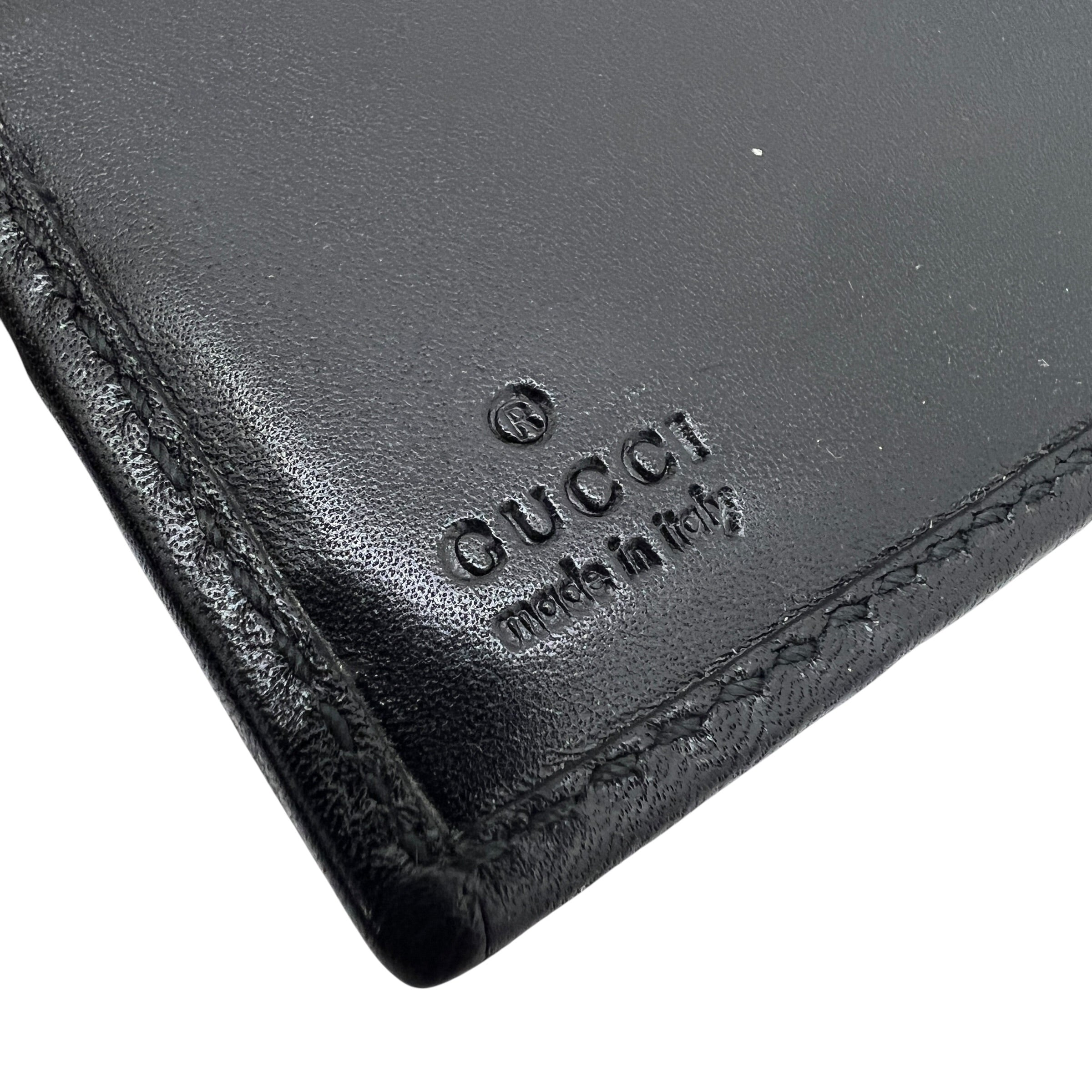 Portafoglio in tela e pelle