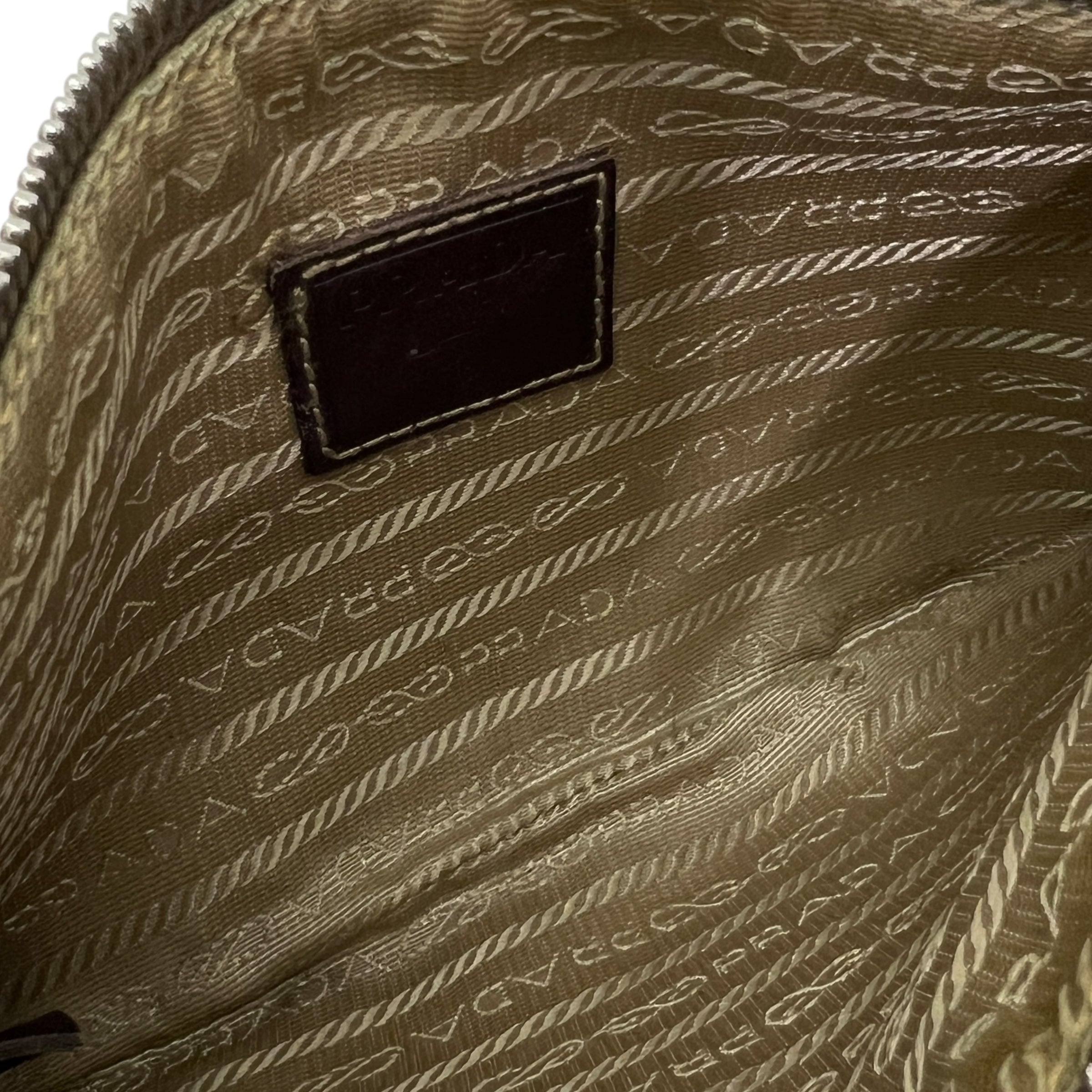 Pochette in tessuto e pelle