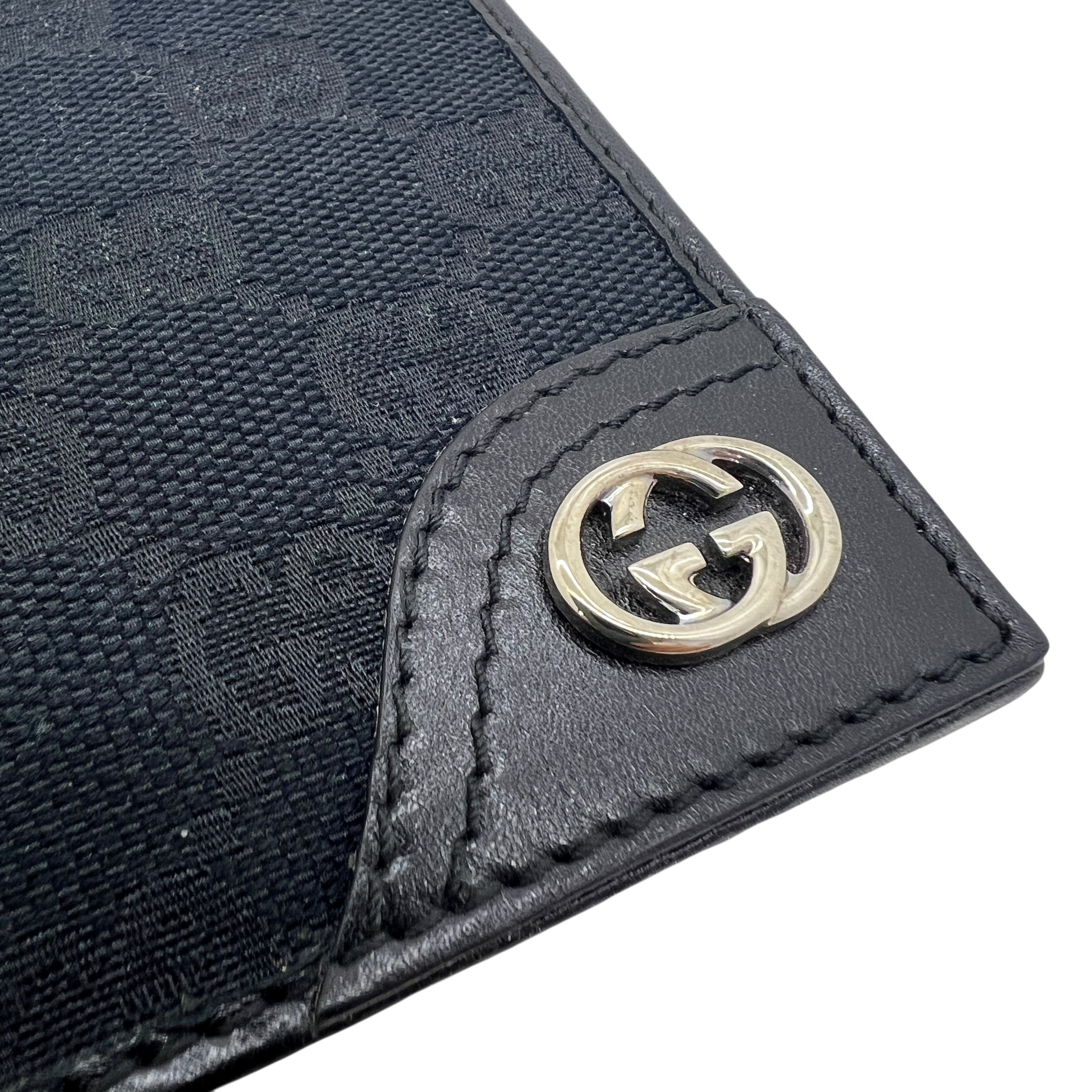 Portafoglio in tela e pelle