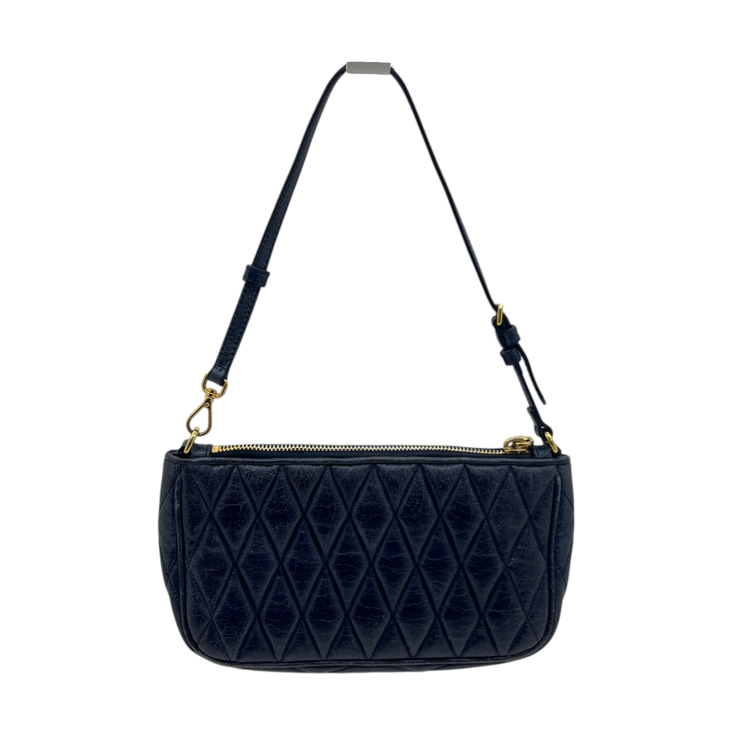 Mini borsa in pelle goffrata