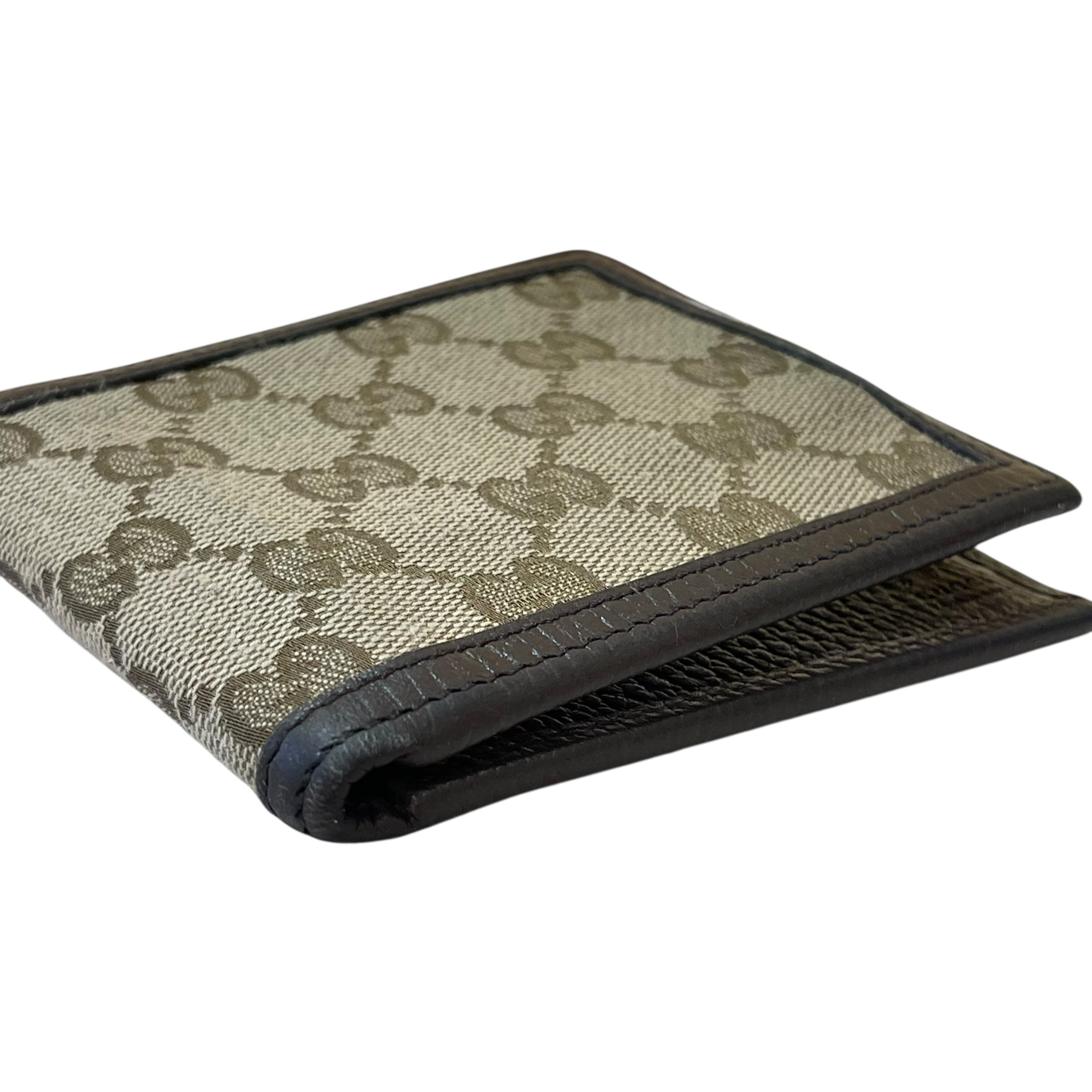 Portafoglio bi-fold in tela GG e pelle