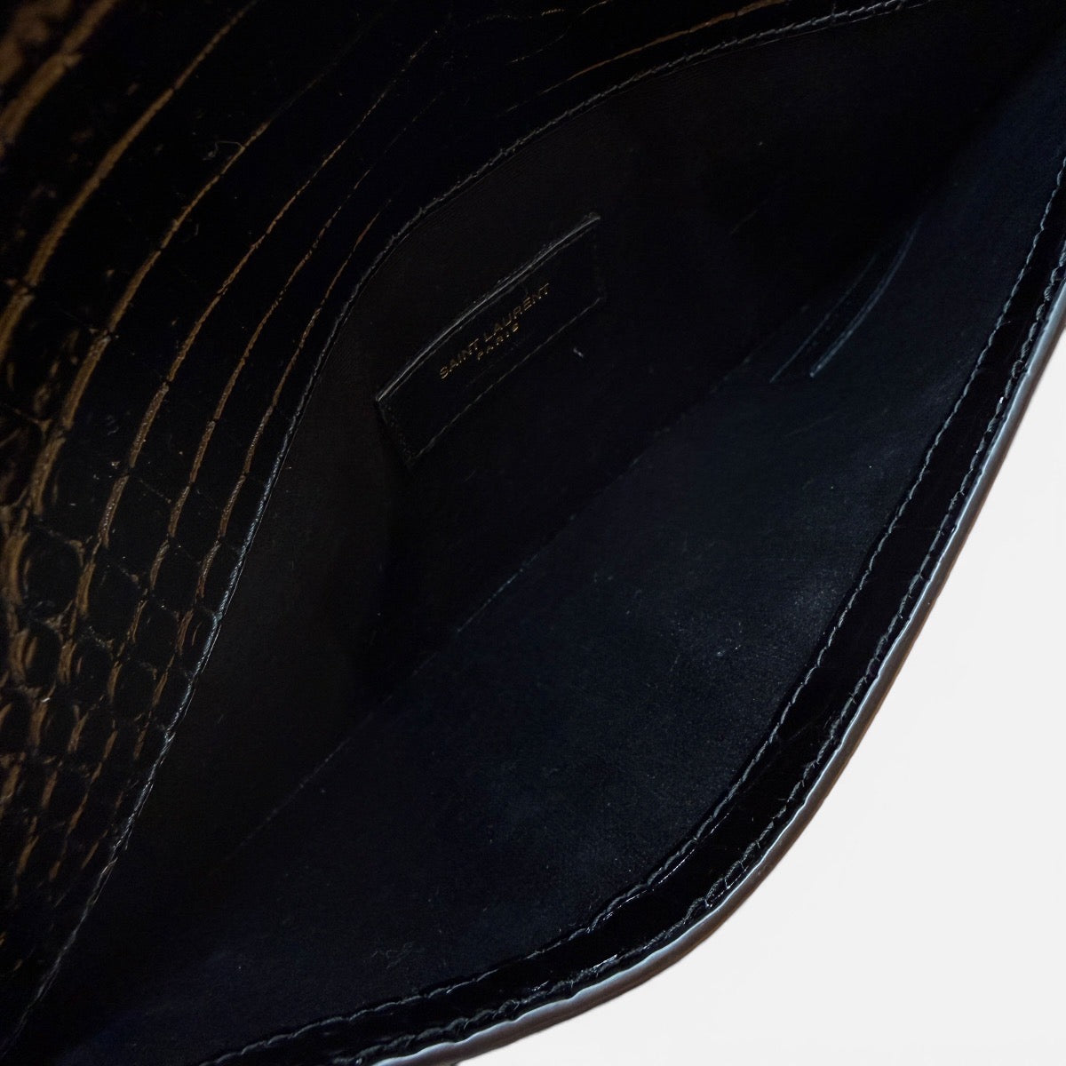 Pochette Uptownin pelle lucida coccodrillo