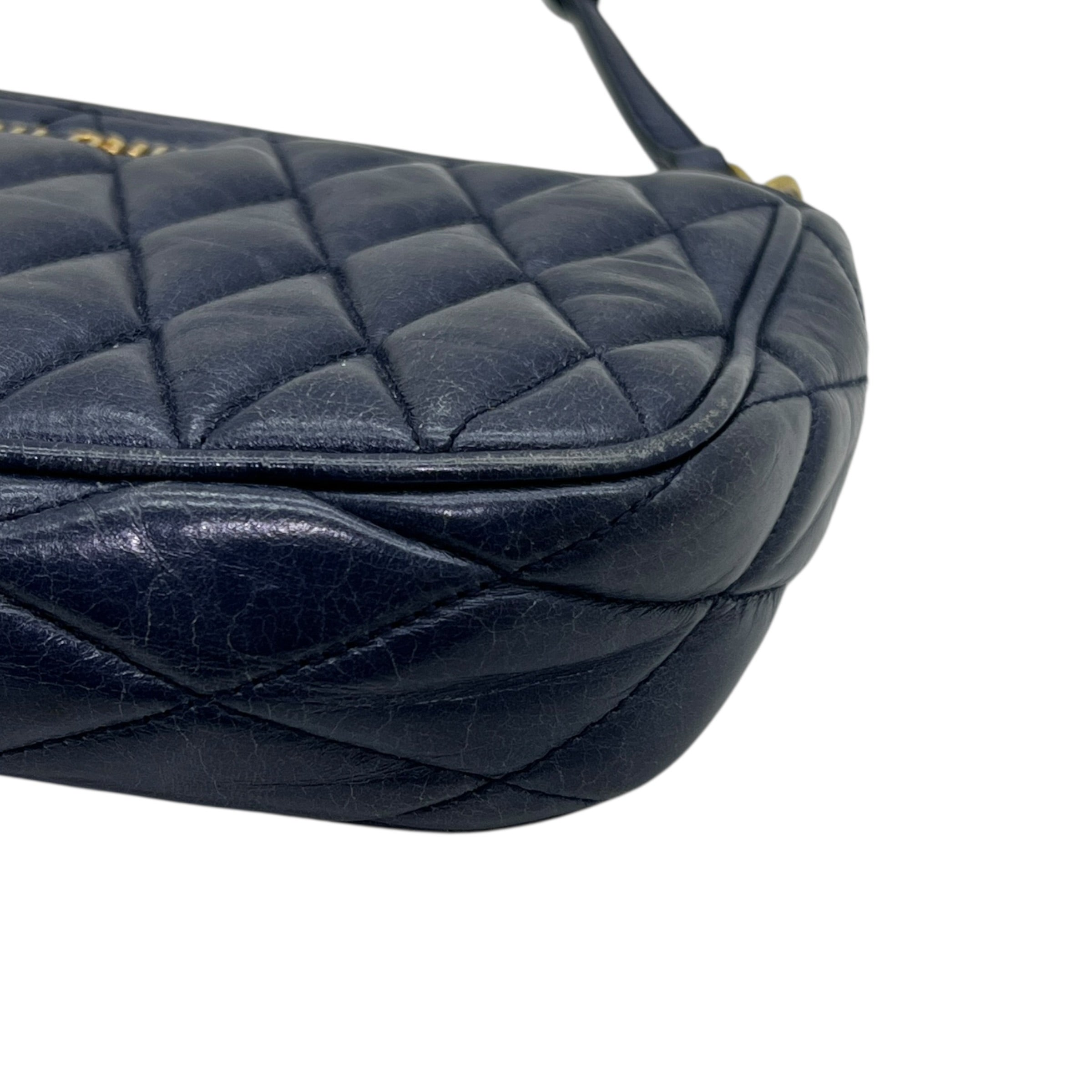 Mini borsa in pelle goffrata