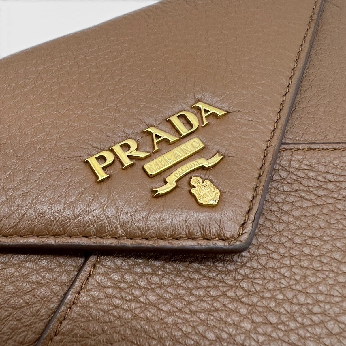 Pochette a busta in pelle