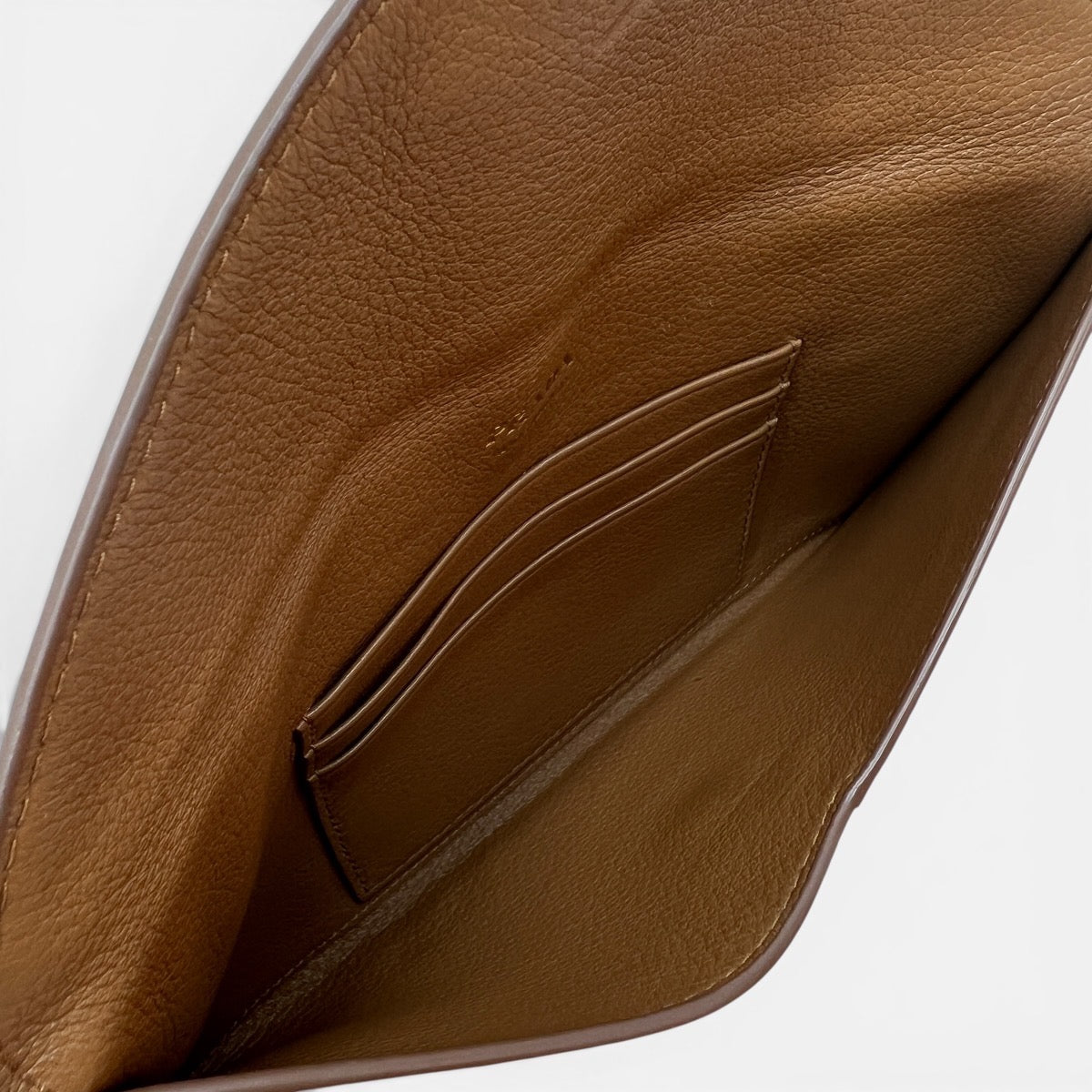 Pochette a busta in pelle