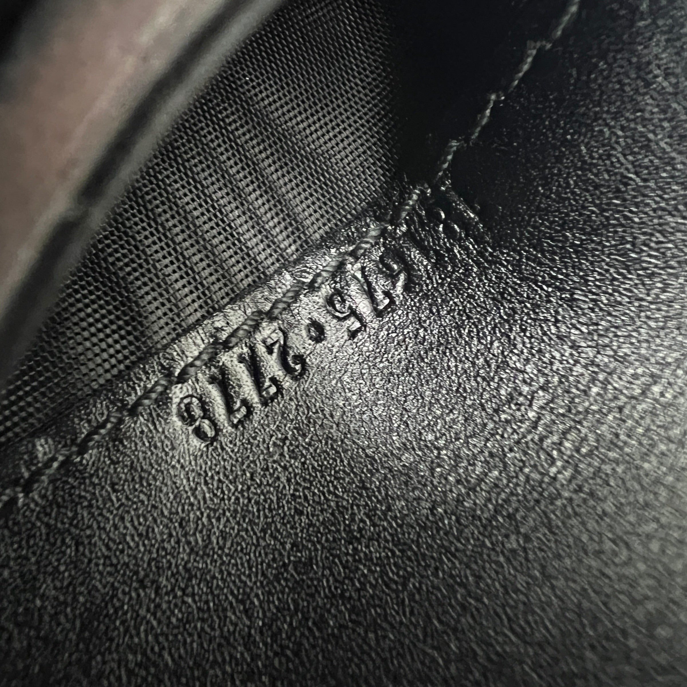 Portafoglio in tela e pelle