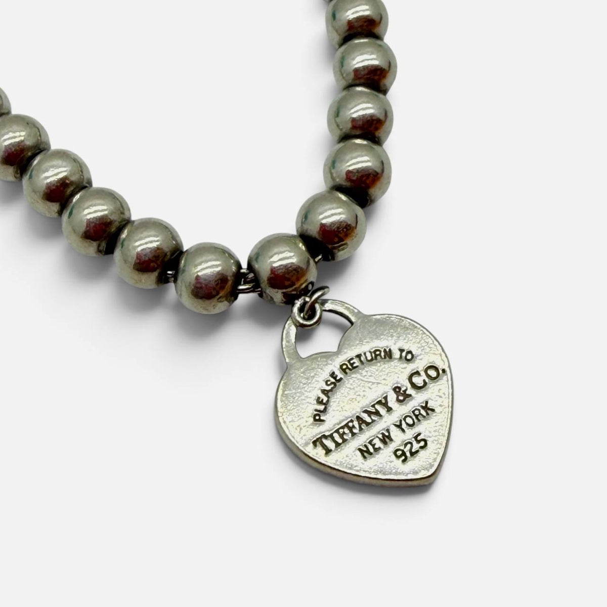Bracciale con pendente Heart tag smaltato rosa cipria