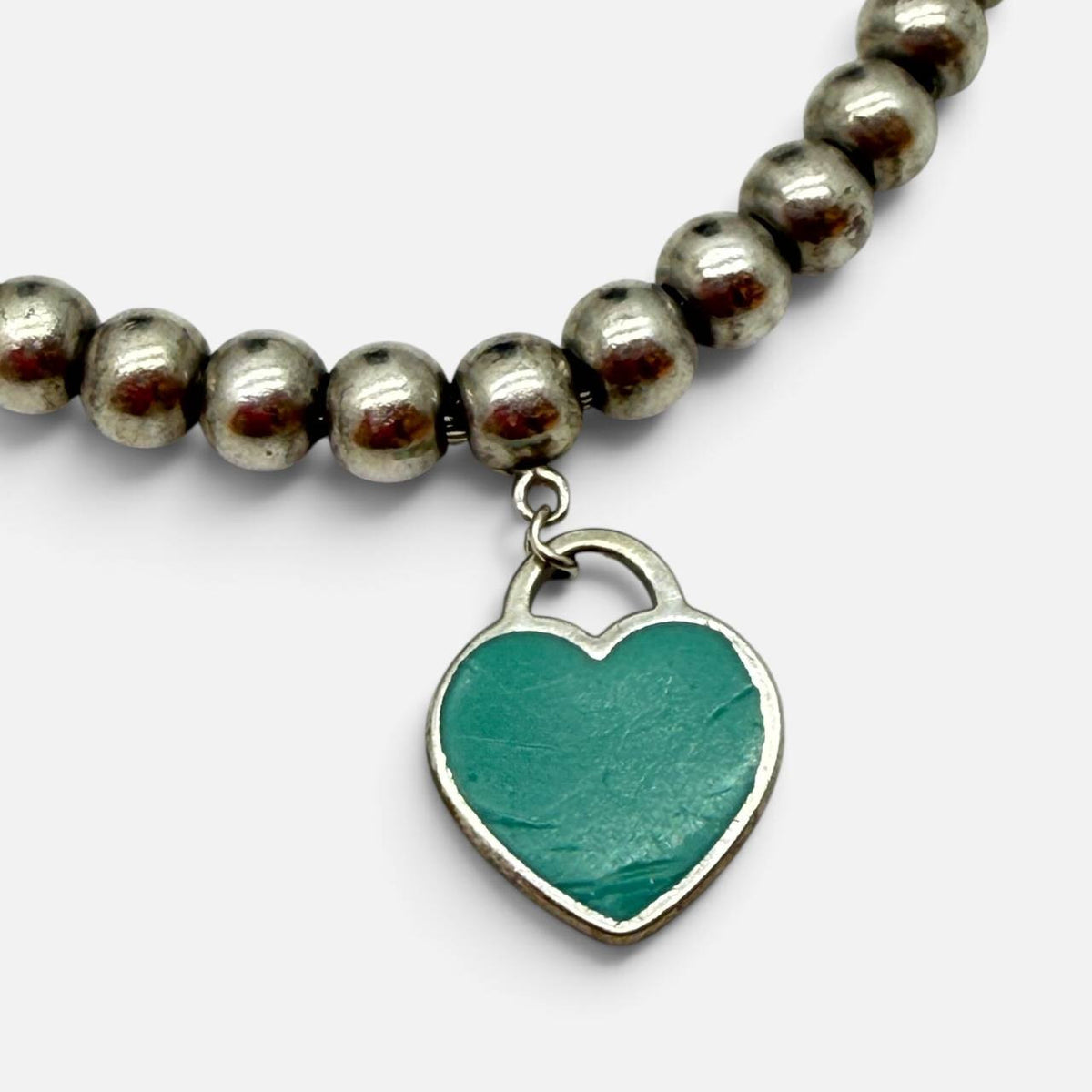 Bracciale Return to Tiffany in argento con pendente smaltato