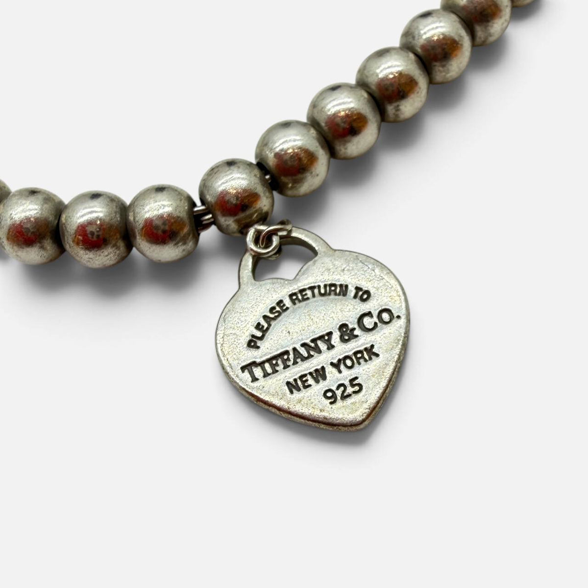 Bracciale Return to Tiffany in argento con pendente smaltato