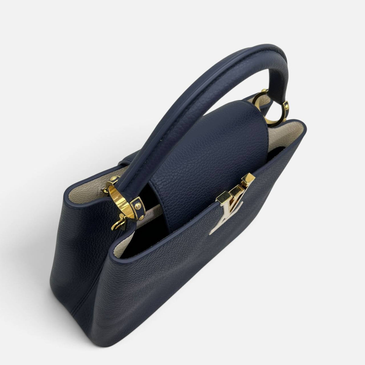 Capucines in pelle blu e bianca