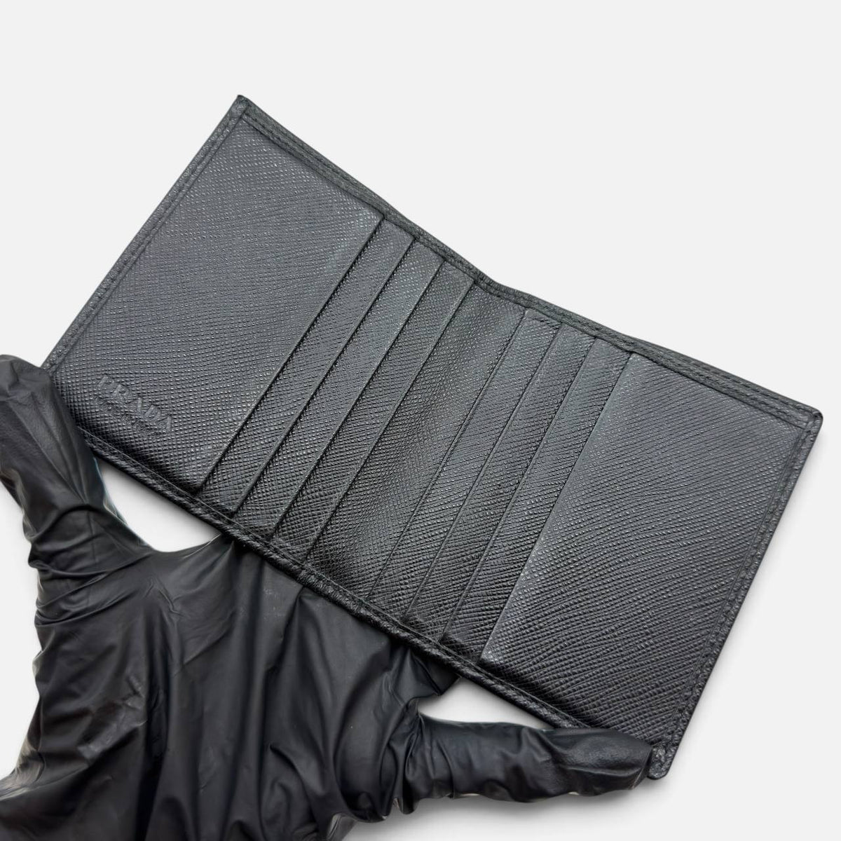 Portafoglio bi-fold in saffiano