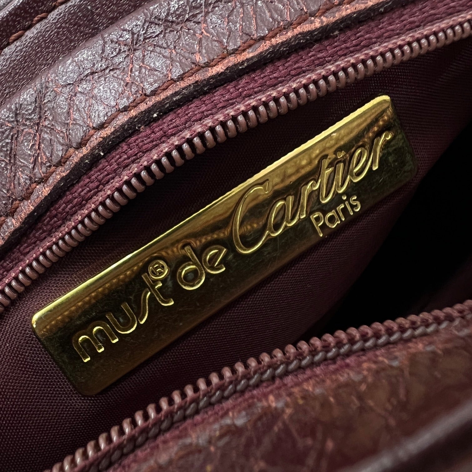 CARTIER MINI POCHETTE MUST DE CARTIER IN PELLE
