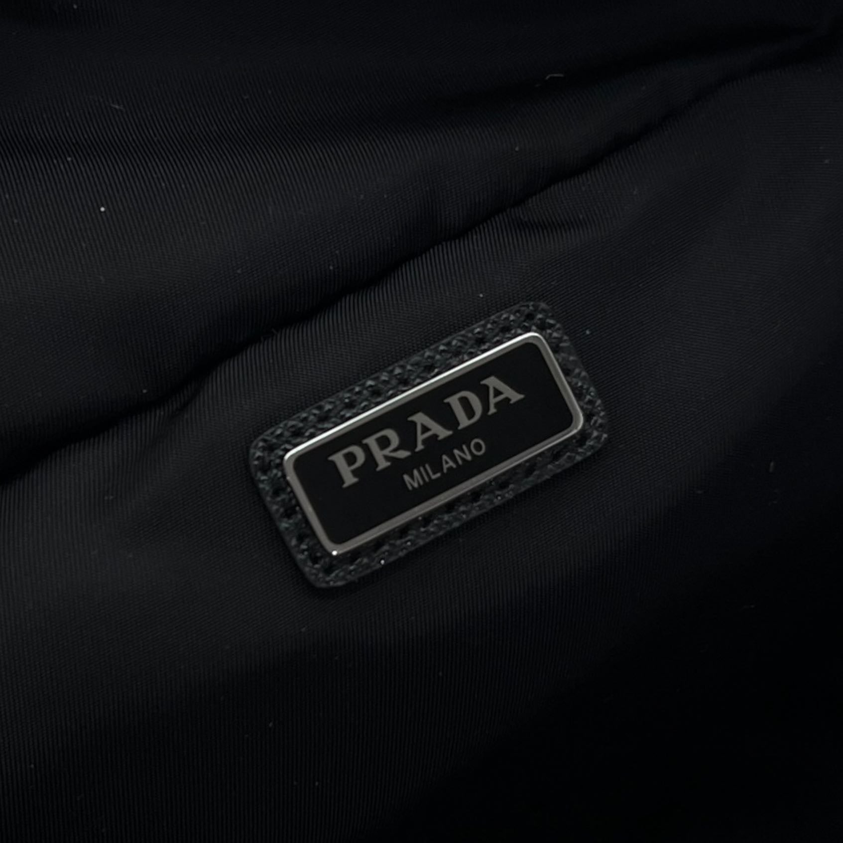 PRADA POUCH DA VIAGGIO IN RE-NYLON E SAFFIANO