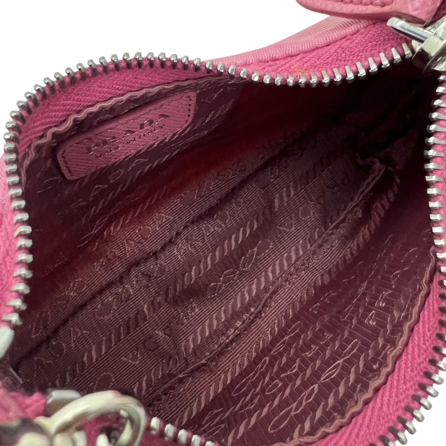 PRADA RE-EDITION MINI BORSA IN RE-NYLON ROSA