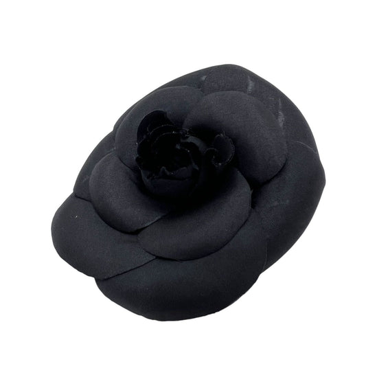 CHANEL BLACK CAMELLIA BROOCH