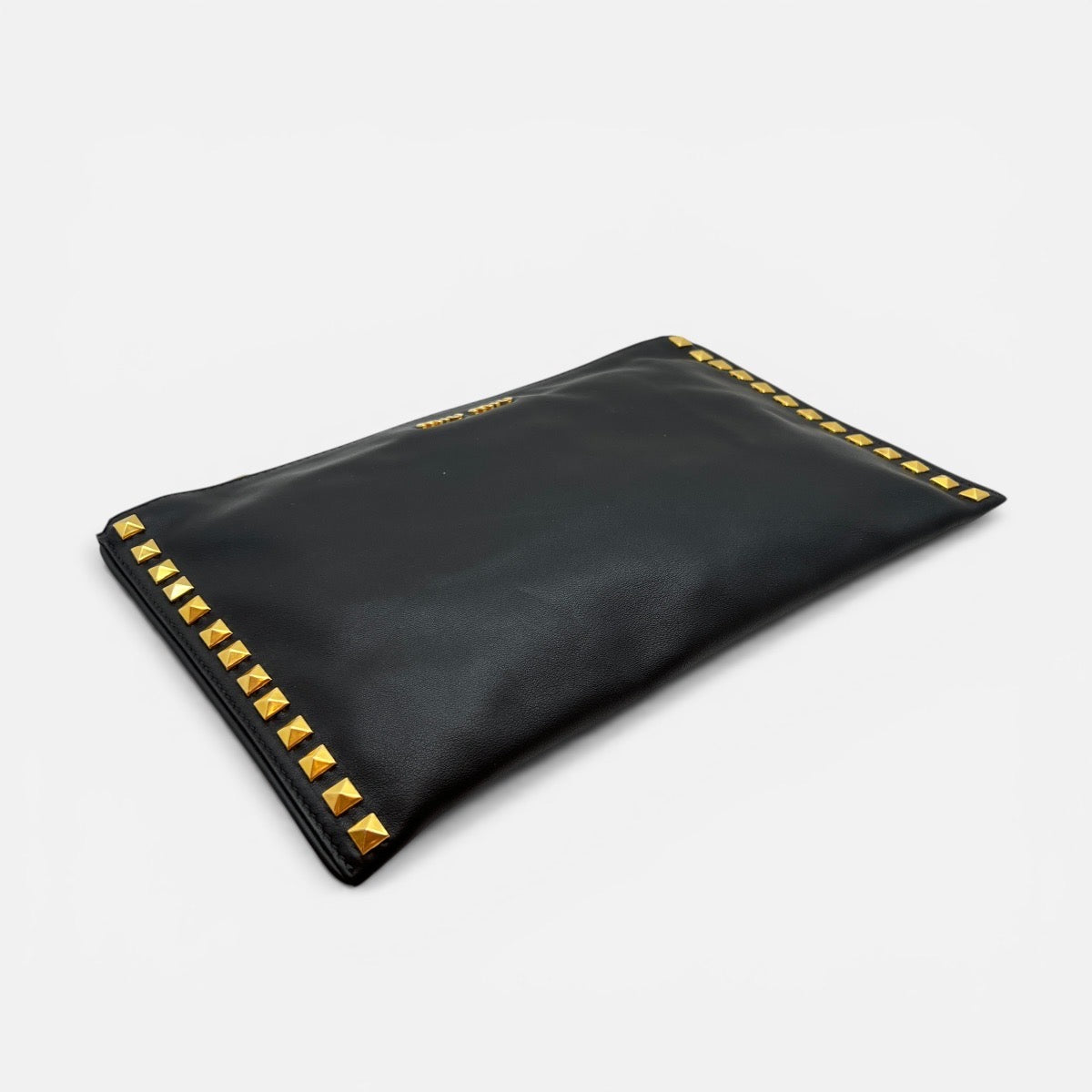 Pochette in pelle con borchie