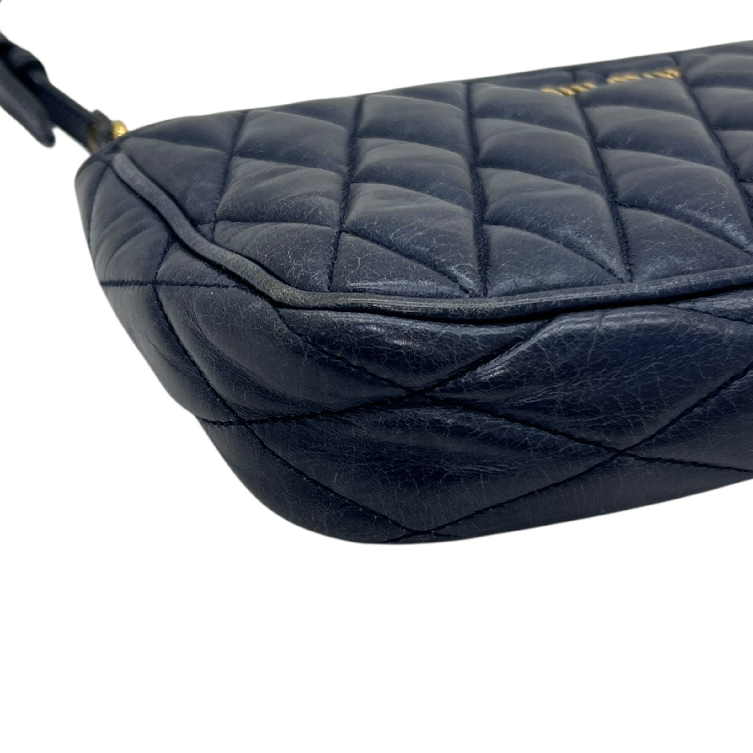 Mini borsa in pelle goffrata