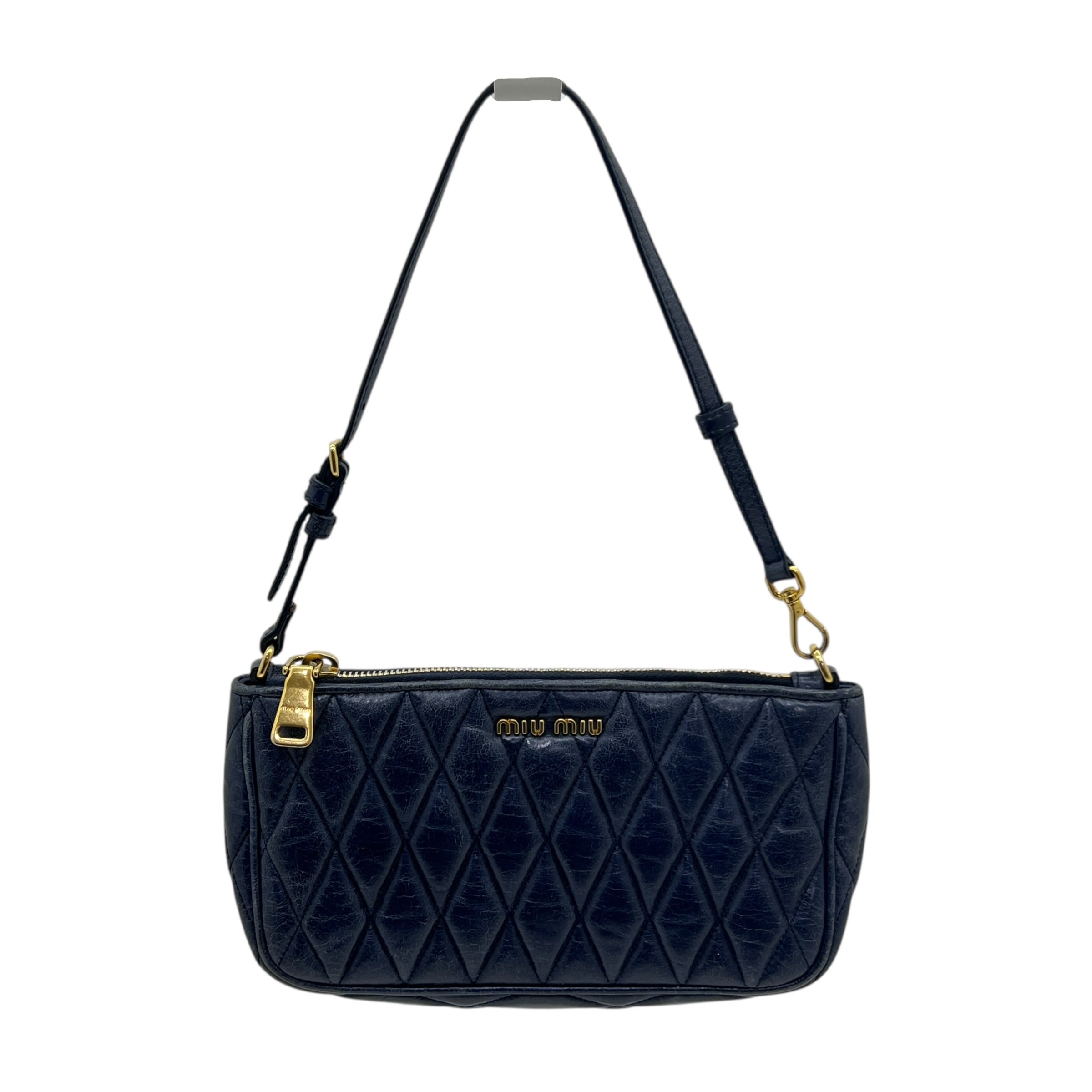 Mini borsa in pelle goffrata