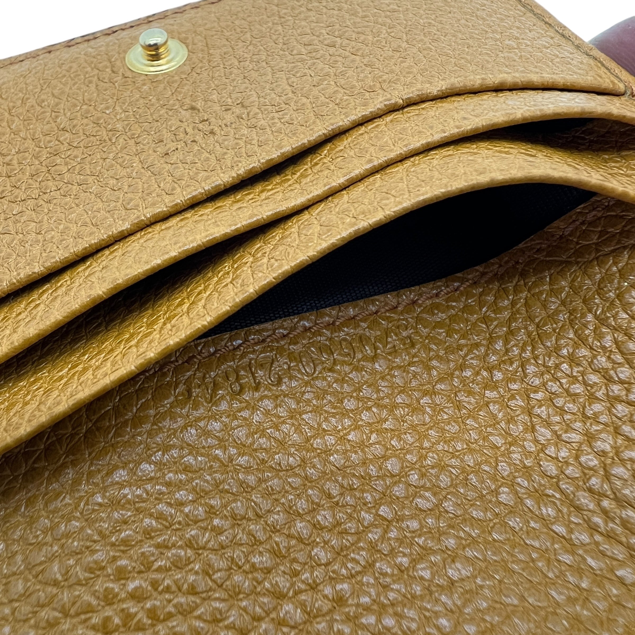 Zumi portafoglio compatto in pelle con catenella