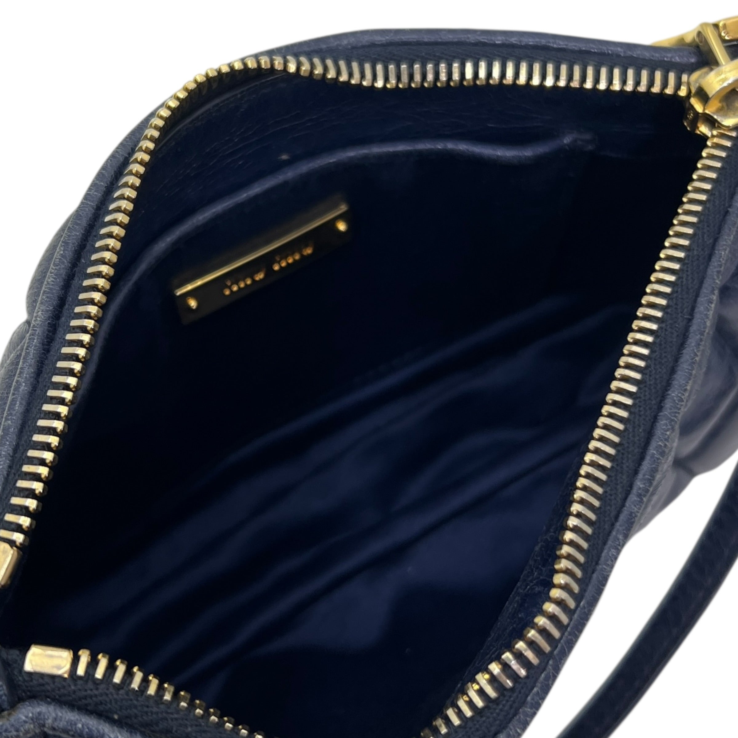 Mini borsa in pelle goffrata