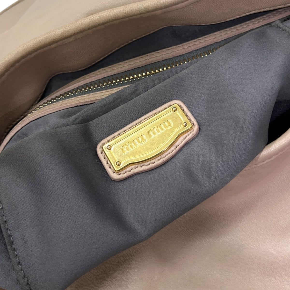 MIU MIU BORSA IN NAPPA GOFFRATA ROSA CON TRACOLLA
