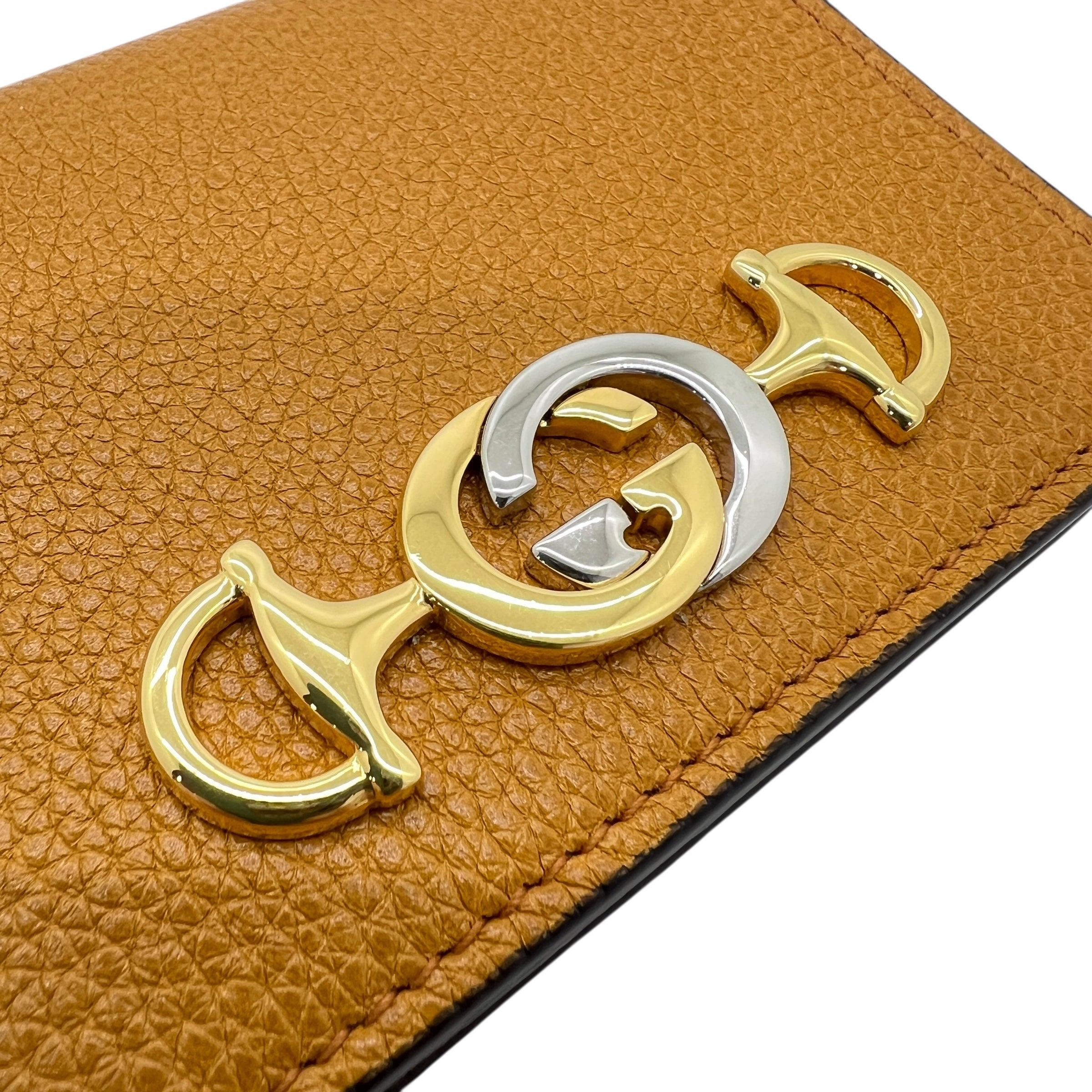 Zumi portafoglio compatto in pelle con catenella