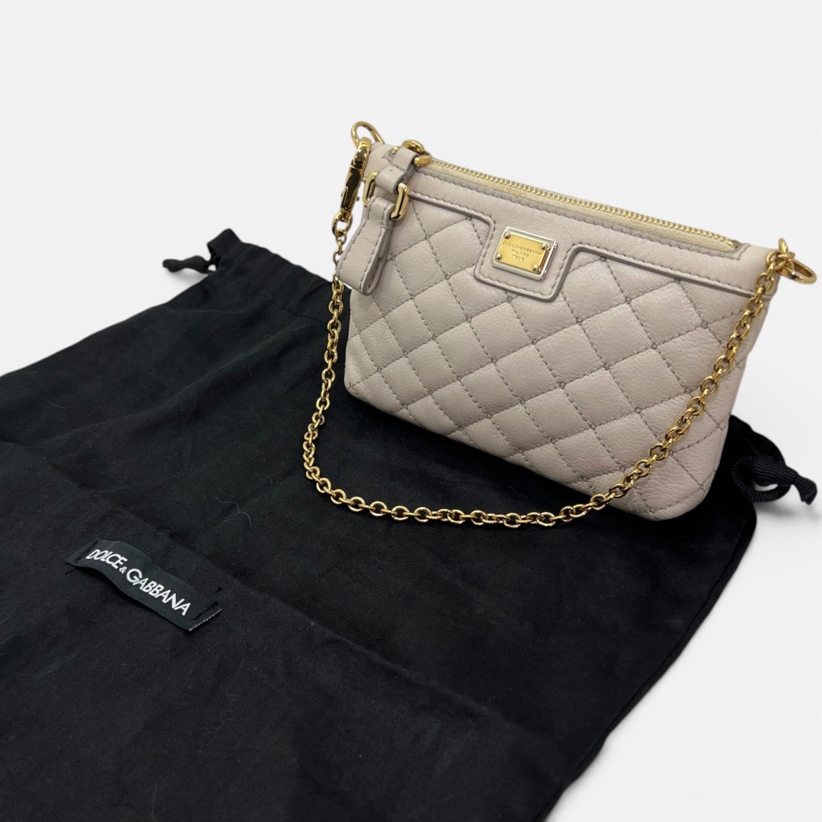 Mini pochette in pelle con catenella