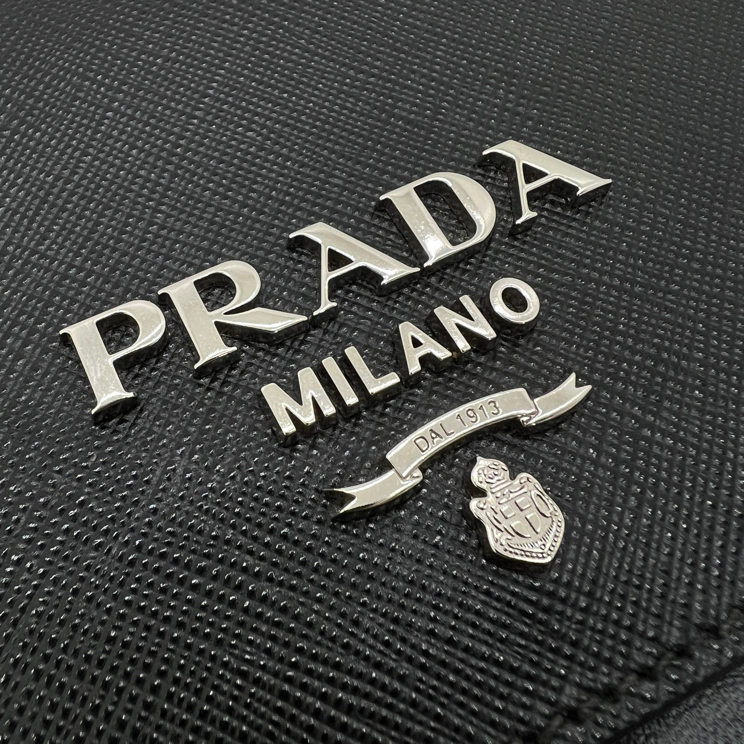 PRADA PATTINA MINI BORSA A TRACOLLA IN SAFFIANO