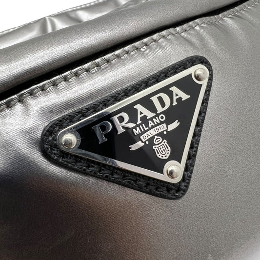 PRADA MARSUPIO IN RE-NYLON ARGENTATO