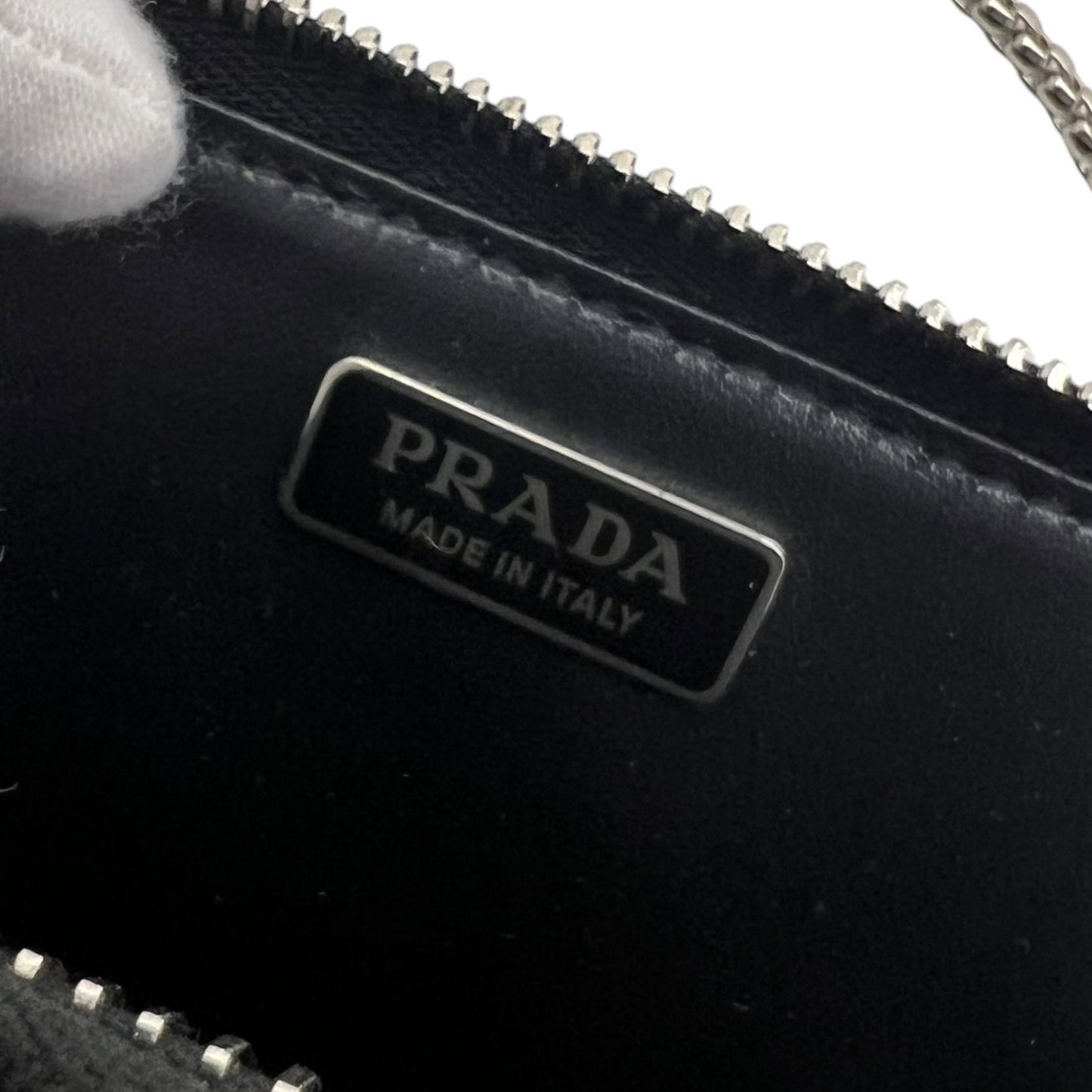 PRADA MINI POUCH TRIANGOLO CON CATENELLA