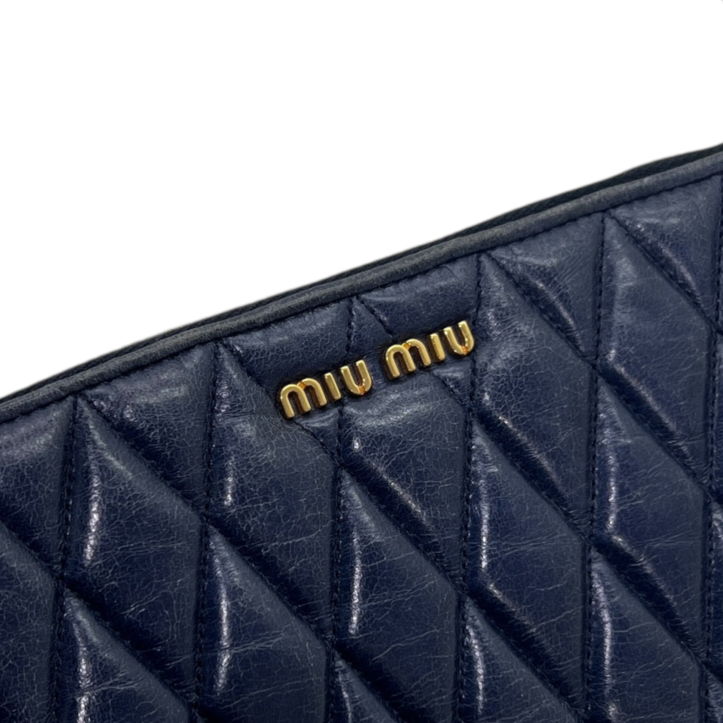 Mini borsa in pelle goffrata