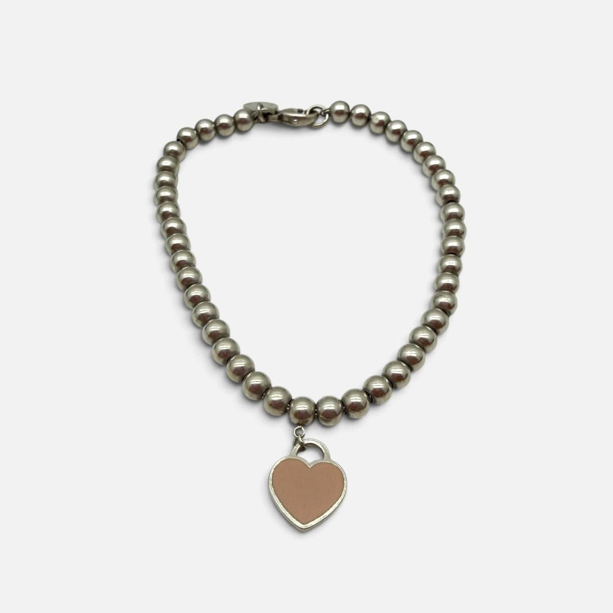 Bracciale con pendente Heart tag smaltato rosa cipria