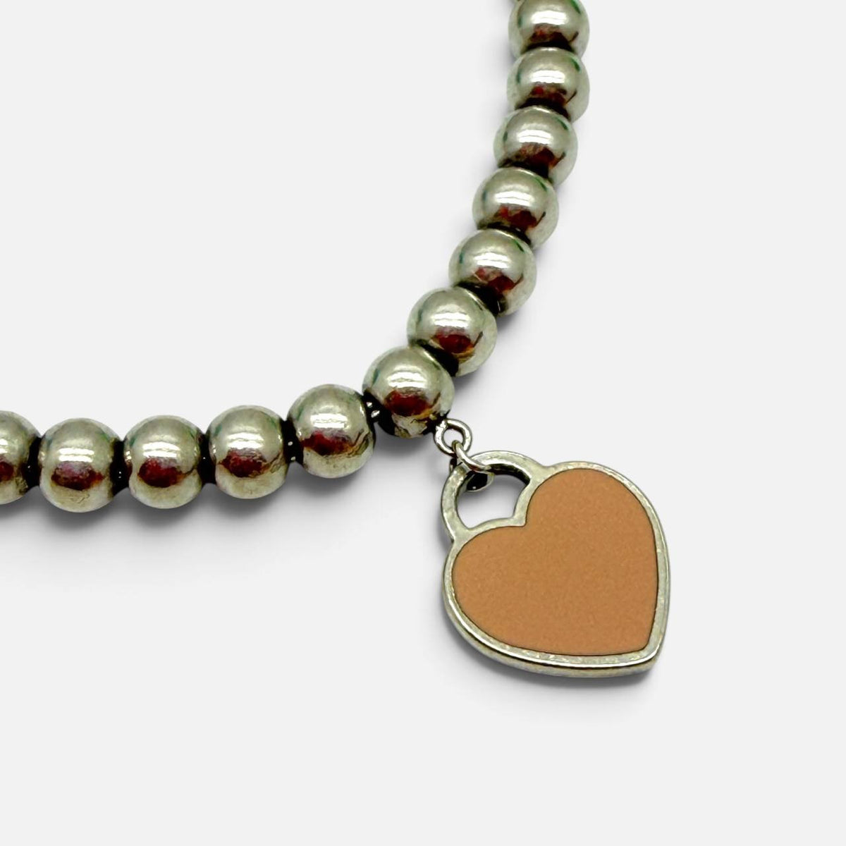 Bracciale con pendente Heart tag smaltato rosa cipria