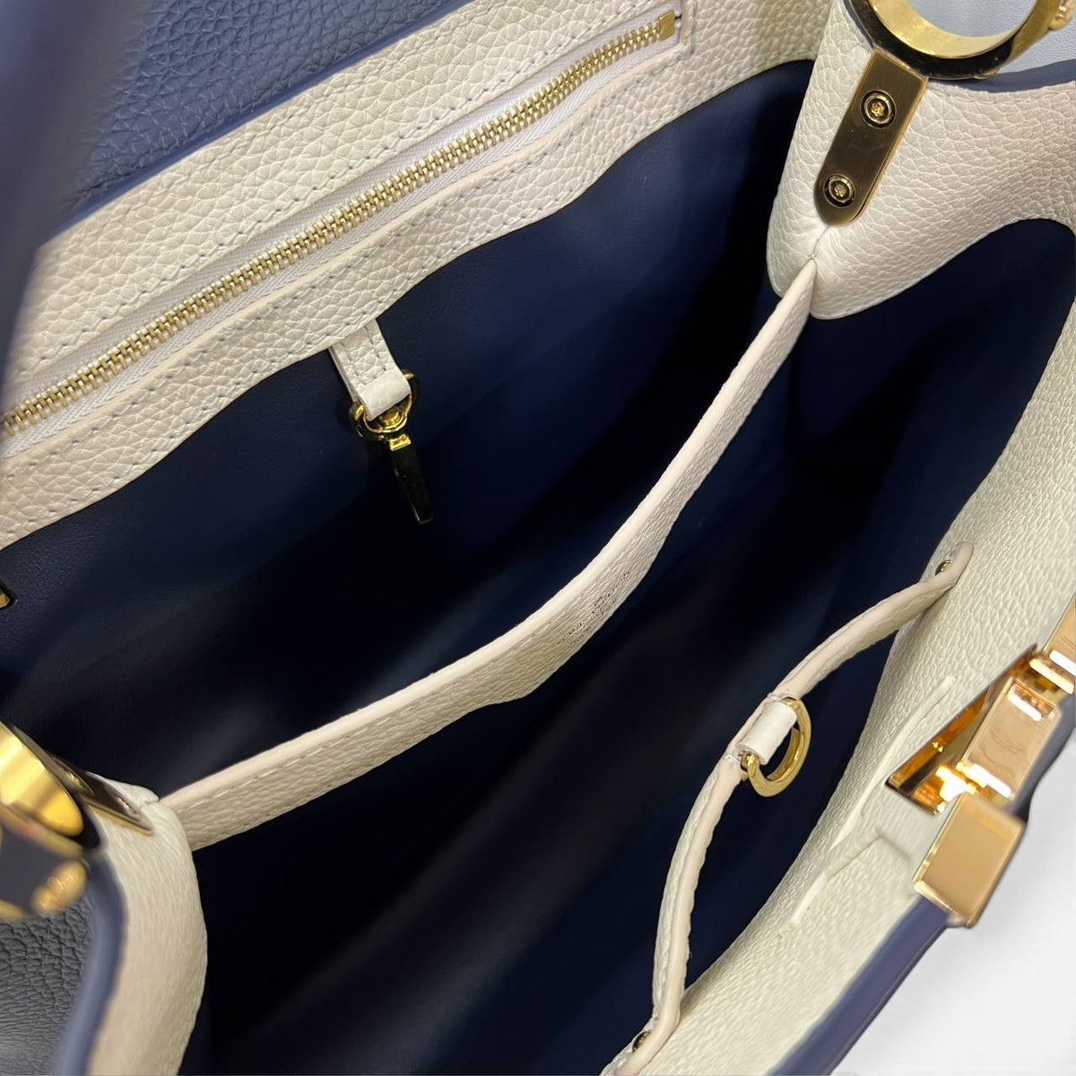 Capucines in pelle blu e bianca
