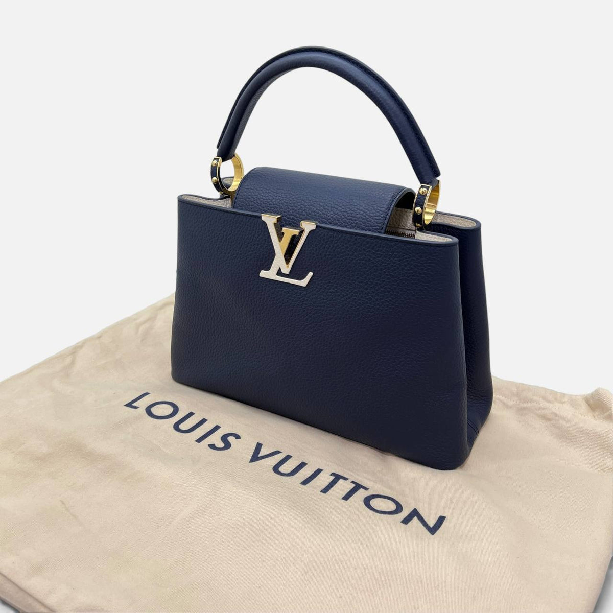 Capucines in pelle blu e bianca