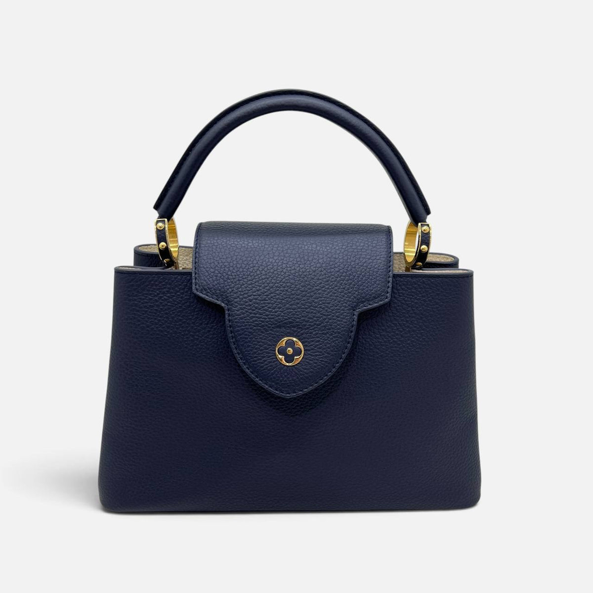 Capucines in pelle blu e bianca