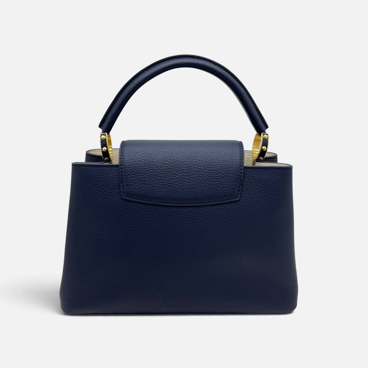 Capucines in pelle blu e bianca