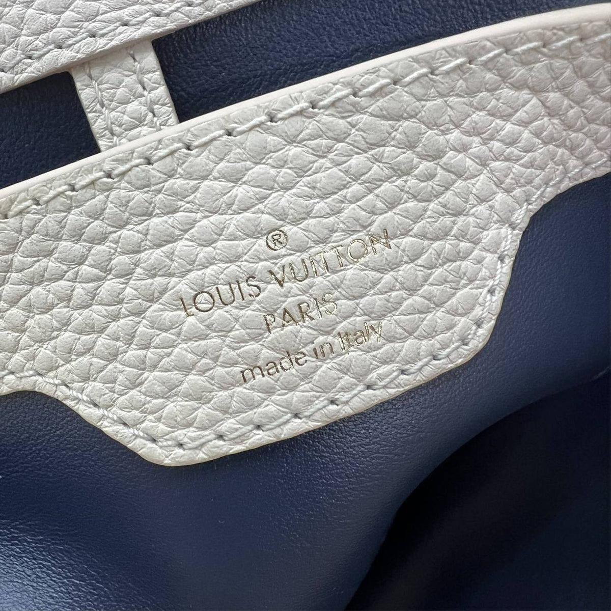 Capucines in pelle blu e bianca